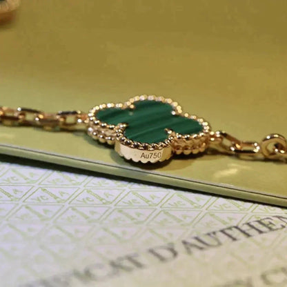 Kleeblatt-Armband mit fünf Motiven – Grün